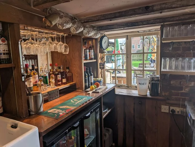The bar at The Cricketers Inn
